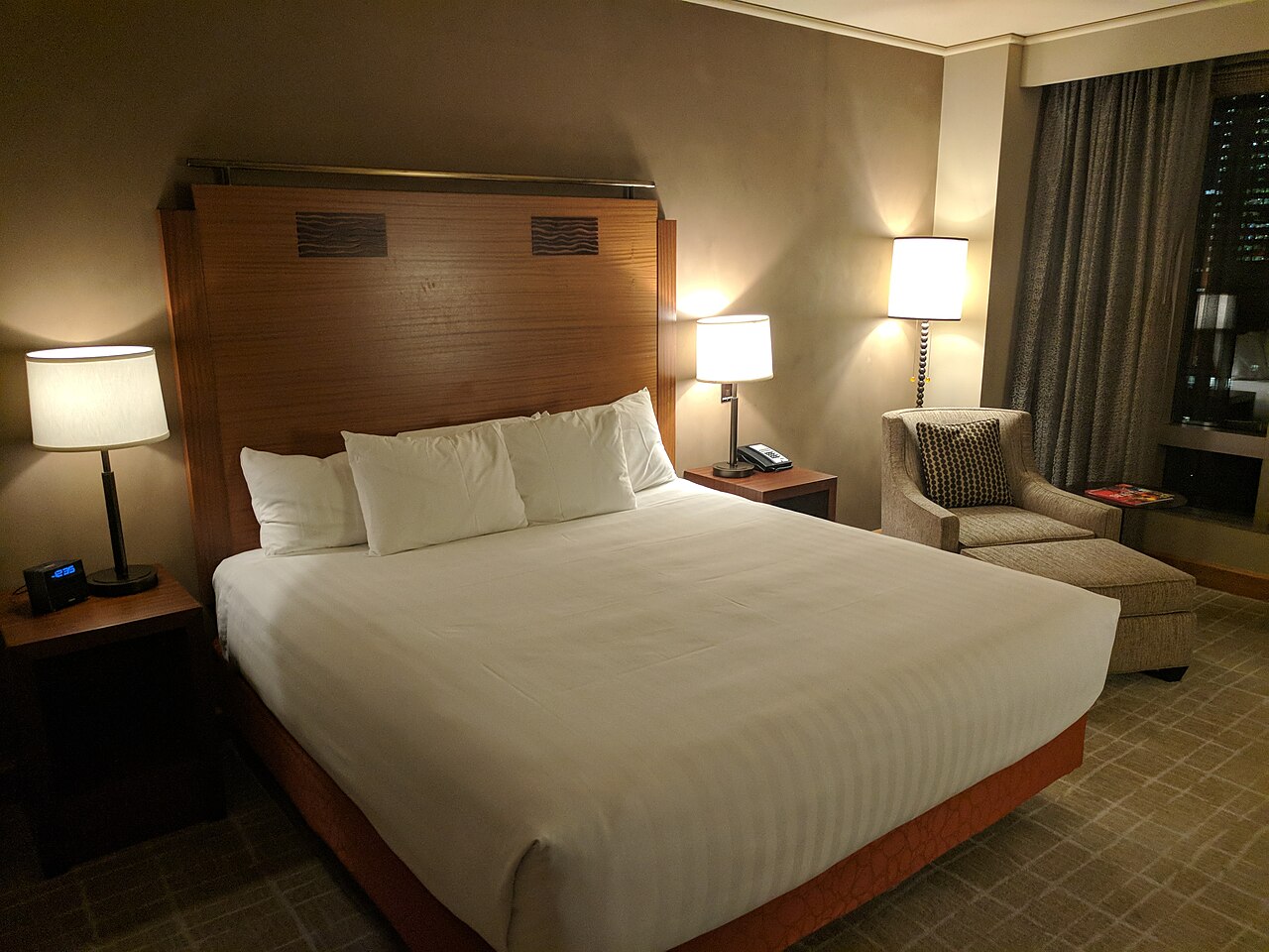 Hotel bed made, room tidy