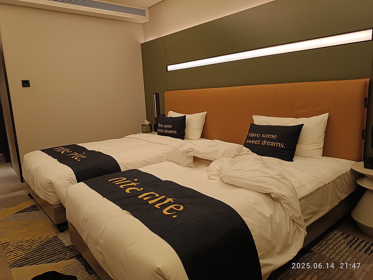Two hotel beds made